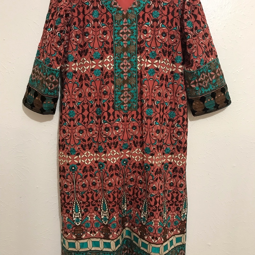 Pakistani trouser kameez suit.